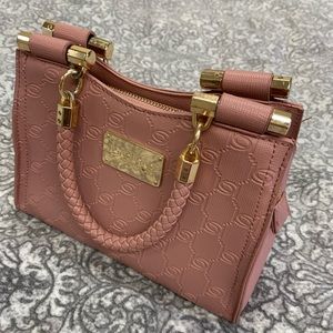 Small handbag. A light pink color and only used once.